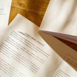 a close up of a book on a wooden table